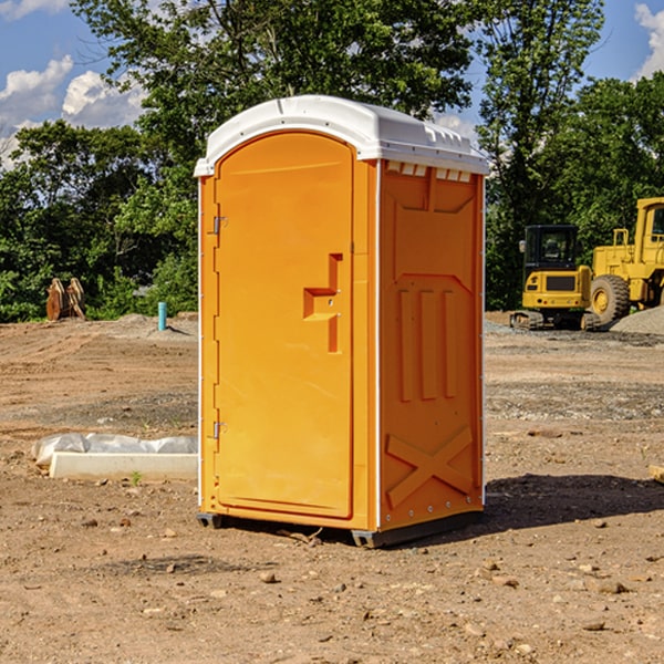 how often are the porta potties cleaned and serviced during a rental period in Guernsey